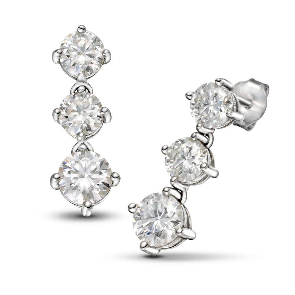Stellar Cascade earrings by Glacier & Aurealis with moissanite in silver.
