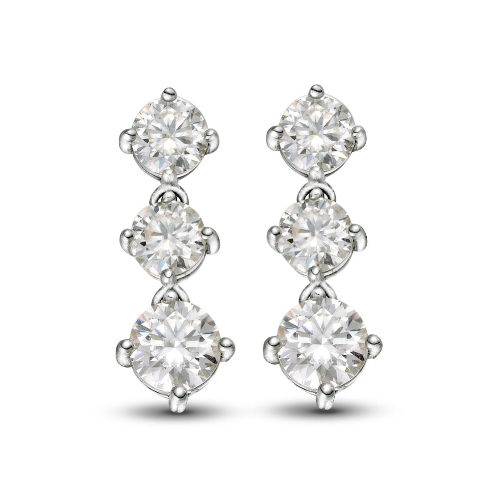Stellar Cascade earrings by Glacier & Aurealis with moissanite in silver.