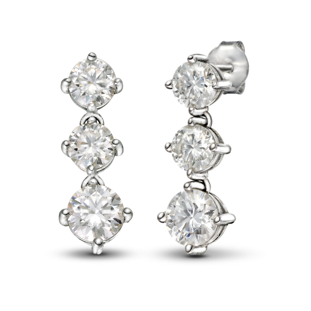 Stellar Cascade earrings by Glacier & Aurealis with moissanite in silver.